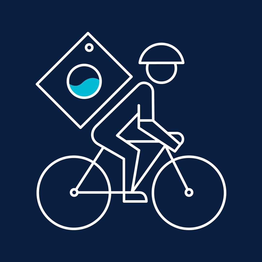 A blue background featuring a cyclist outlined in white, with a washing machine on his back like a backpack