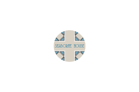 Seaborne House logo in blue and cream circle
