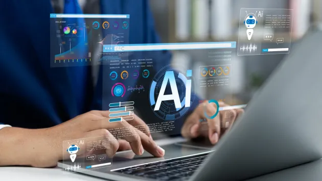 AI digital symbols and laptop