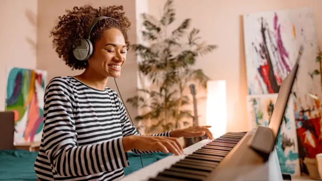 musician playing a keyboard