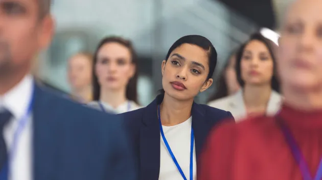 business event - participant listening to speech 
