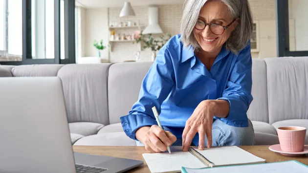 Mature businesswoman working from home