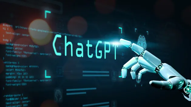 Text - ChatGPT with a robot pointing at the text 