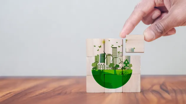Net zero symbols on jigsaw pieces