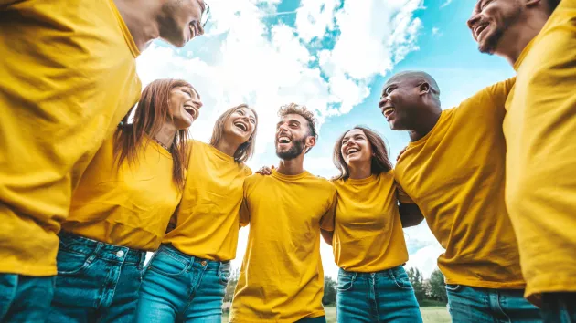 Community group wearing yellow t-shirts 