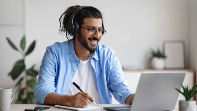 Person listening to a webinar 