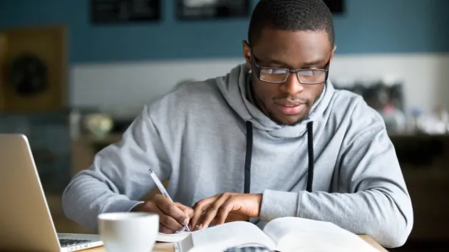 Person studying using a laptop