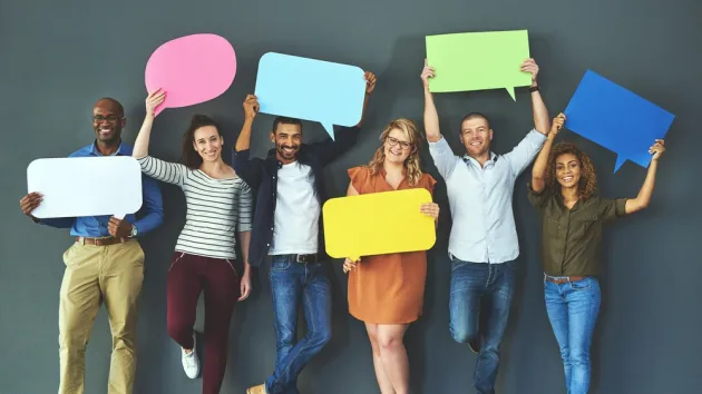 people holding speech bubbles