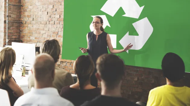 Networking Connection, group meeting, recycling symbol on a poster