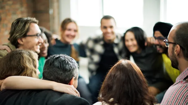 team members in a circle 