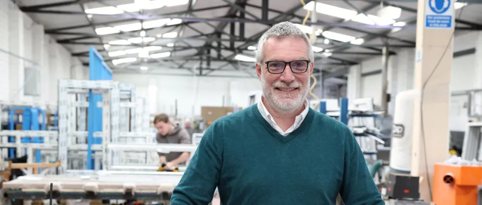 Richard Gambling of GRM Windows stood in their window making factory 