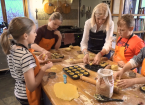 Lisa teaching children to cook