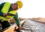 A railway engineer working on a track.