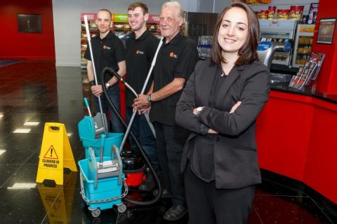 The team of Apollo Wales with cleaning products.