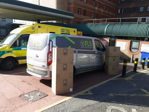 An FLS van outside a hospital.