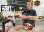 gearing up for the festive season with a christmas rib of welsh black beef and rack of prime welsh lamb fourth generation farmer and butcher shaun hall jones from llanybydder pictured in his butchery busi