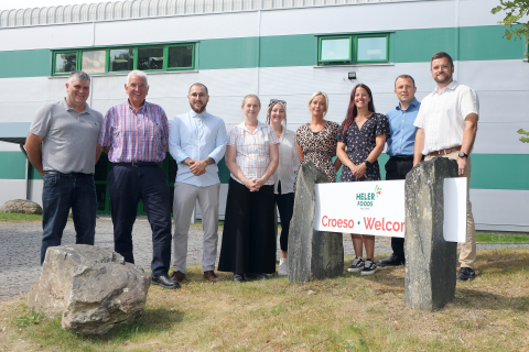 Employees of Heler Foods outside their Headquarters