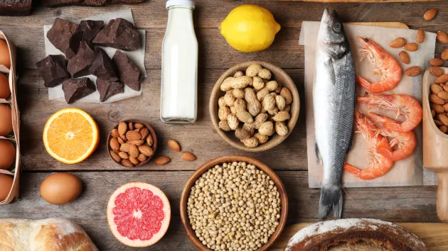 fish, milk, nuts, wheat, citrus fruits - food allergy concept 