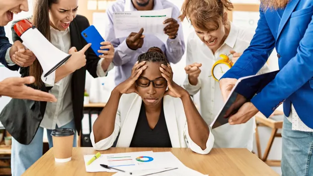 stressed office worker under pressure 