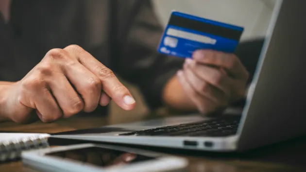 person paying online for a product 