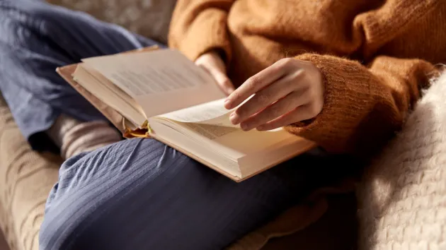 person reading a book 