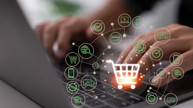 procurement - laptop, electronic symbols - shopping trolley