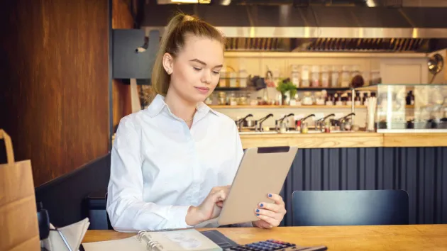 small business owner doing their accounts 