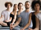 people meditating together visualising during yoga 
