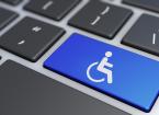 Website and internet online content accessibility and accessible computing or assistive technology concept with wheelchair icon and symbol on a blue laptop computer key 3D