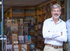 Portrait Of Male Bookshop Owner Outside Store