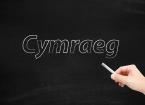 the word 'Cymraeg' written on a chalk board