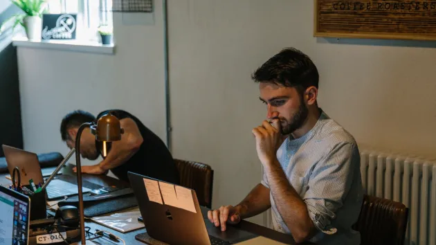 Man looking at laptop