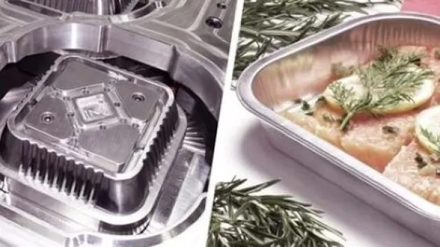 An aluminium food try in production and an aluminium tray full of food