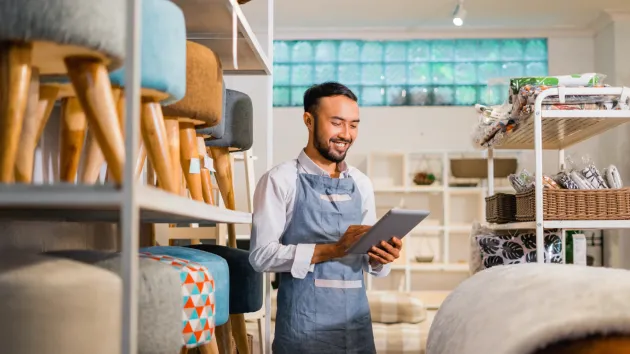 Online furniture seller checking stock 