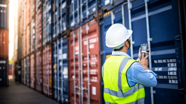 Shipping containers - logistics worker 