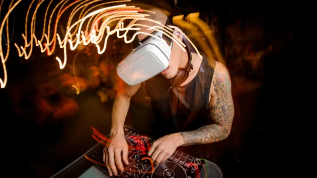 DJ wearing a VR headset 