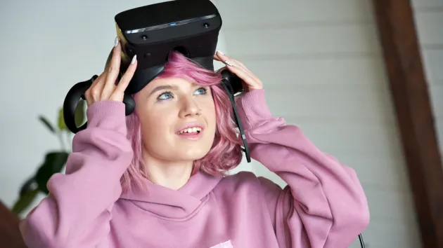 Student wearing virtual reality headset 