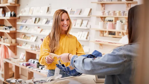 Small Business Owner serving a customer 