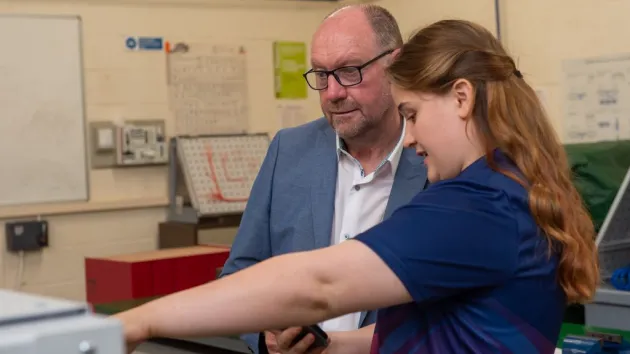 The Deputy Minister for Skills and Tertiary Education, Cefin Campbell and  Madeleine Warburton.
