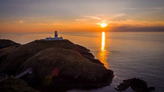 Strumble Head lighthouse at sunrise 