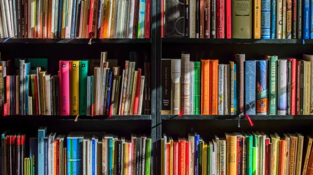 books on shelves in a library 