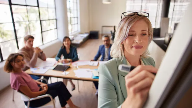 female manager giving a presentation 