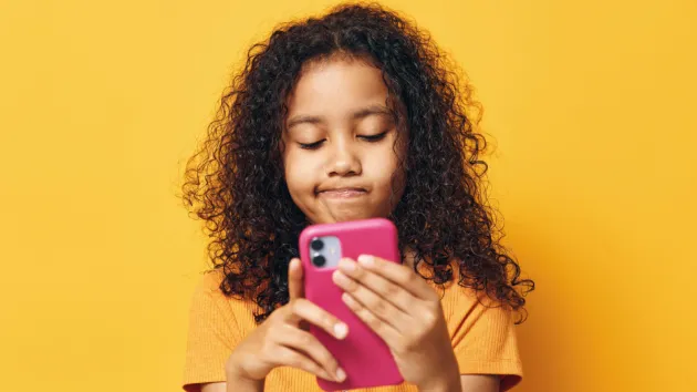 Young person using a digital device 