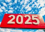 the numbers 2025 in white on red background with blue sky and clouds 