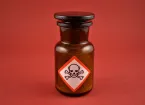 Brown glass bottle with poison symbol - skull and crossbones