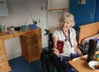 Ally John, a resident at Parklands Care Home, video calls with her son and his dog.