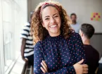 Female business owner smiling 