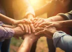 volunteers holding hands 