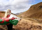 person draped in a Welsh flag 