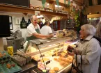Wrexham Market - food stall with customers 